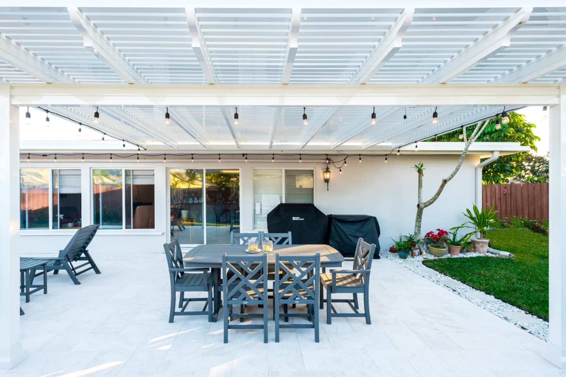 Modern aluminum pergola over a backyard patio